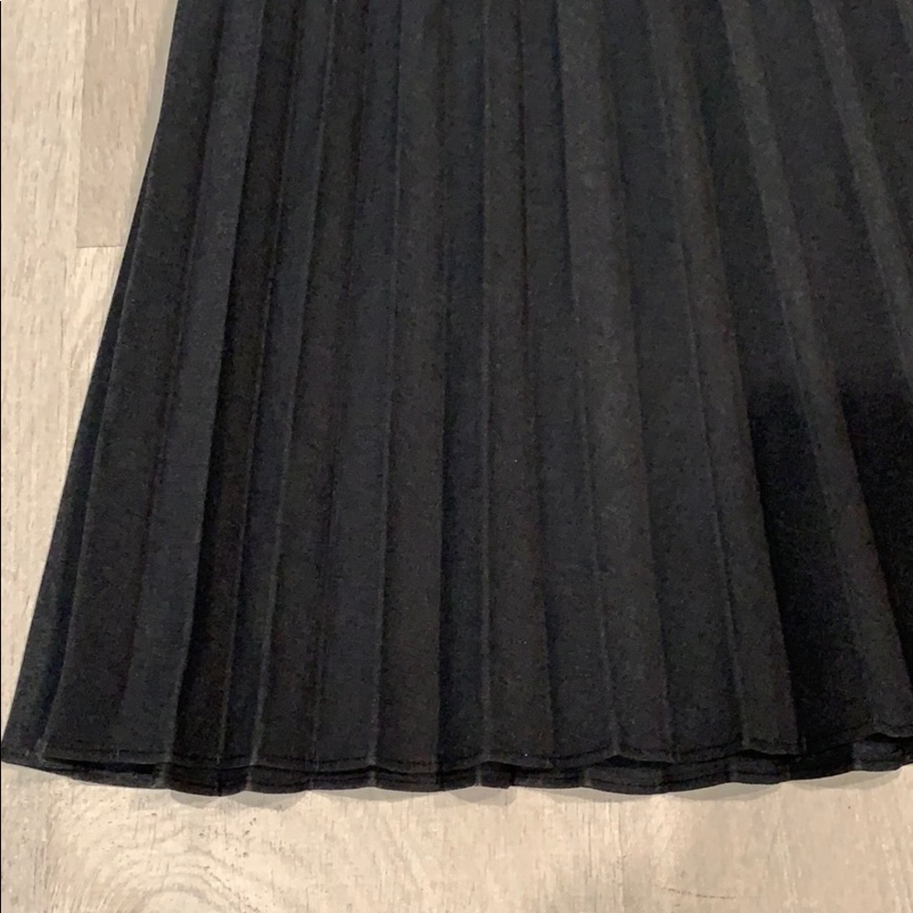 Grey dressy skirt with multi folds. Almost new